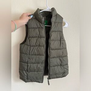 green puffer vest
